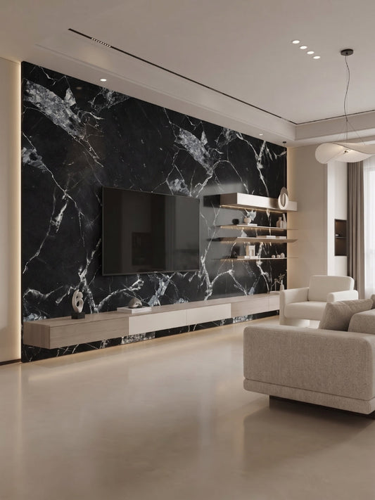 Black and white marble PVC wall panels installed behind a TV in a modern living room