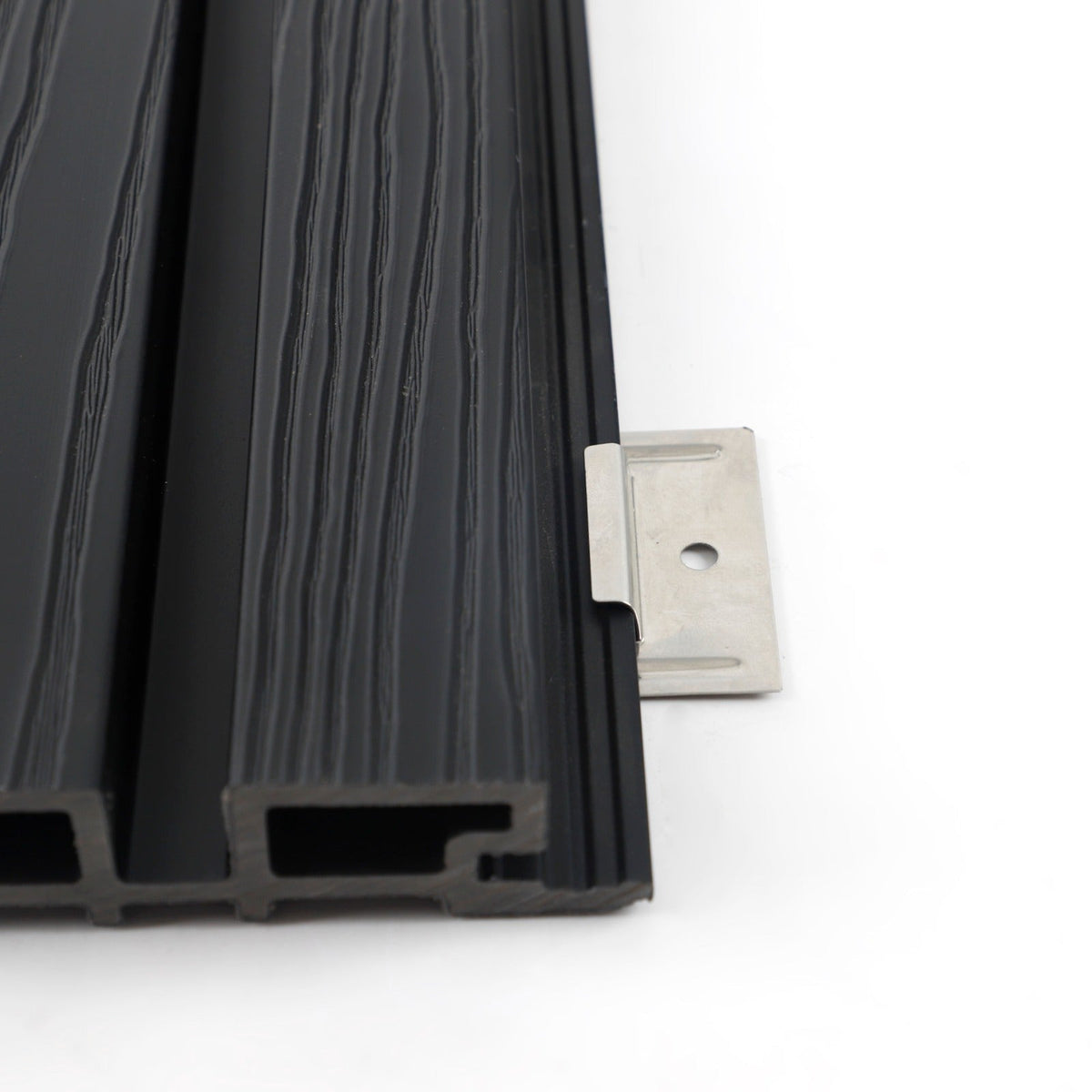 Side view of stainless steel installation bracket extending from black composite cladding