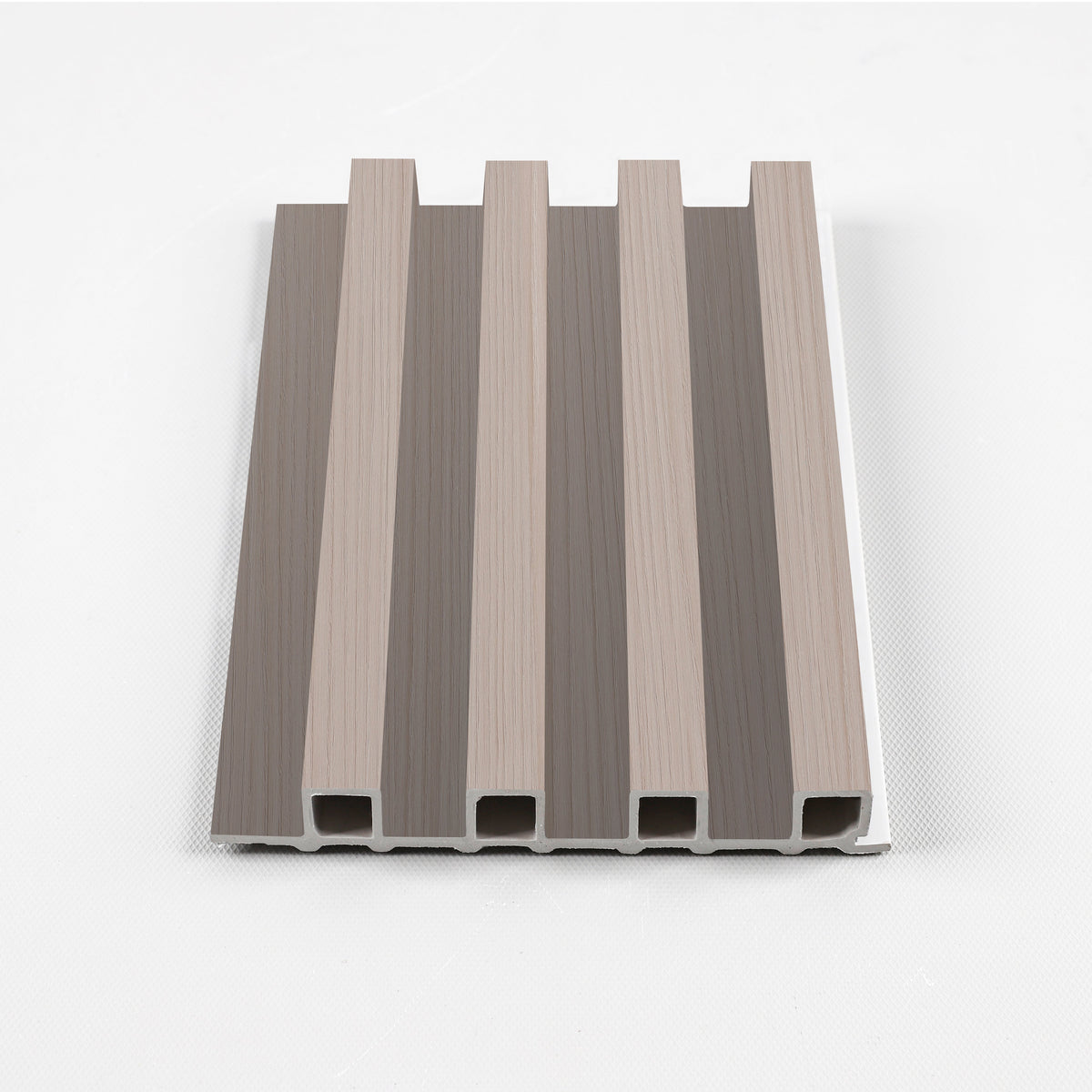 Cedar Oak WPC fluted 3D wall panel cross-section with raised slats and hollow core construction