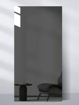 Full-length Gray Mirror Wood Veneer Panel in a dark reflective finish, 9x4 ft and 8 mm thick