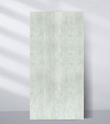 Pale off-white PVC sheet sample with subtle vertical texture and fine speckling
