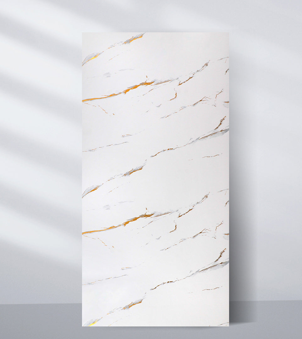 White PVC marble sheet sample with thin diagonal gray and caramel-colored veins