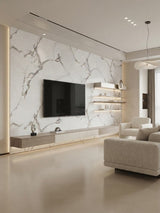 Calacatta White marble-look PVC wall panels installed behind a TV in a modern living room