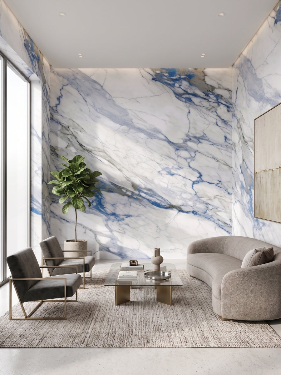 Modern living room with Calacatta Azur PVC marble sheets covering the walls in bold blue-gray veining