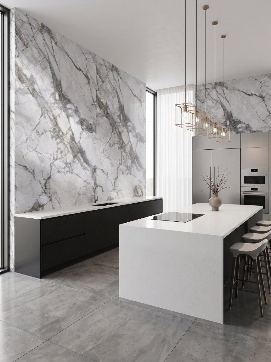 Modern kitchen with white PVC marble sheets featuring bold gray veining on the walls