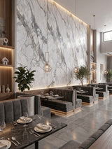 Restaurant dining area with tall white PVC marble wall sheets and dramatic gray veining