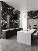 Modern kitchen with Doral Night marble PVC wall panels, black cabinetry, and a white island