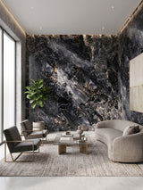 3D Zena black marble PVC panels installed on living room walls behind a curved sofa and chairs