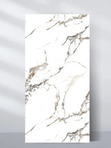 Beige Ibiza marble PVC wall panel, 4 x 8 ft, with a white background and flowing gray and beige veining
