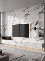 Beige Ibiza marble PVC wall panels installed on a modern TV wall with a floating console and shelves