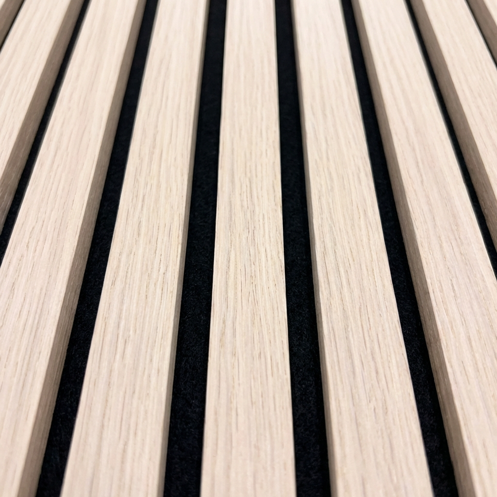 Close-up of natural oak wood grain slats and black acoustic backing