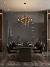 Gray mirror wood veneer panel used as a reflective feature wall behind a formal dining table