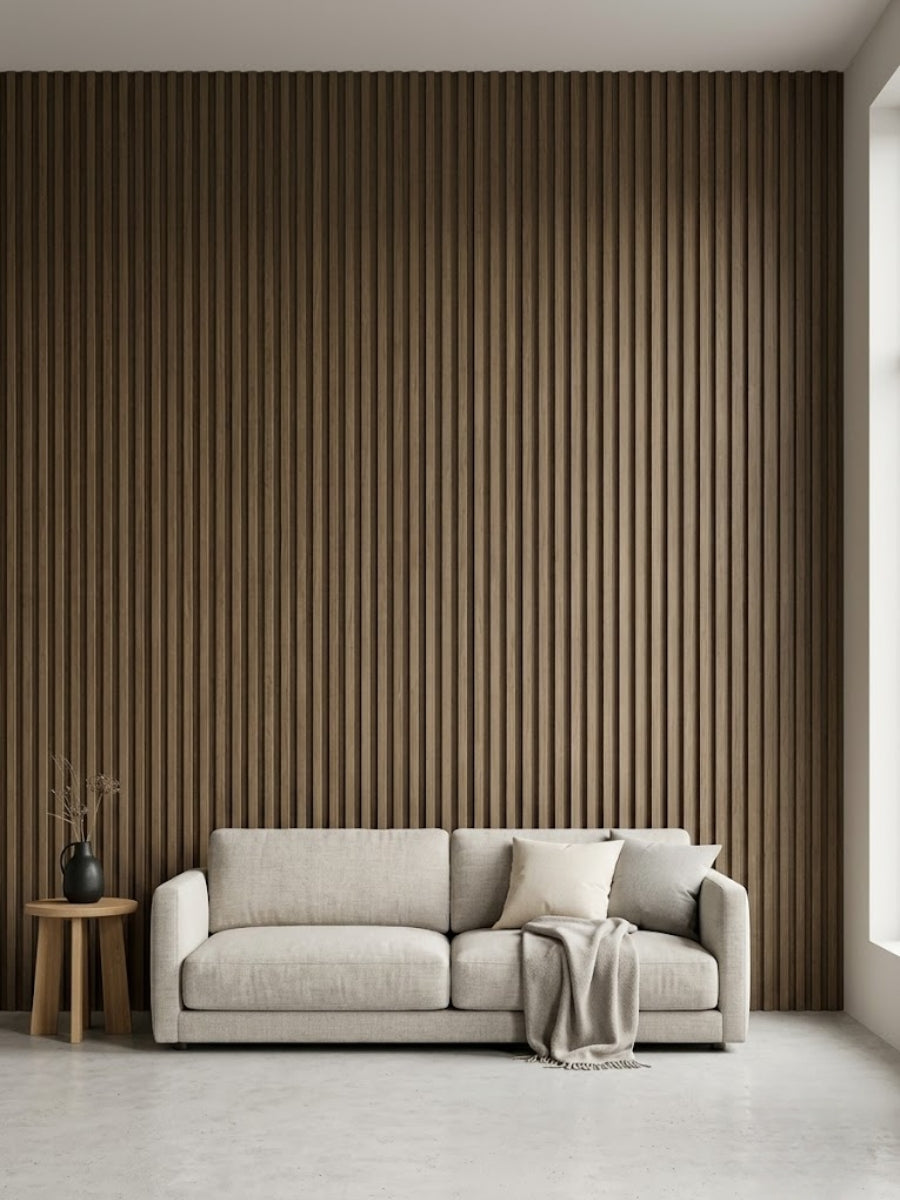 Floor-to-ceiling Royal Oak WPC fluted wall panels creating a wood-look living room accent wall