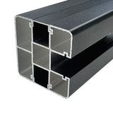 Angled cross-section of the dark gray fence post showing hollow chambers and slotted side channels