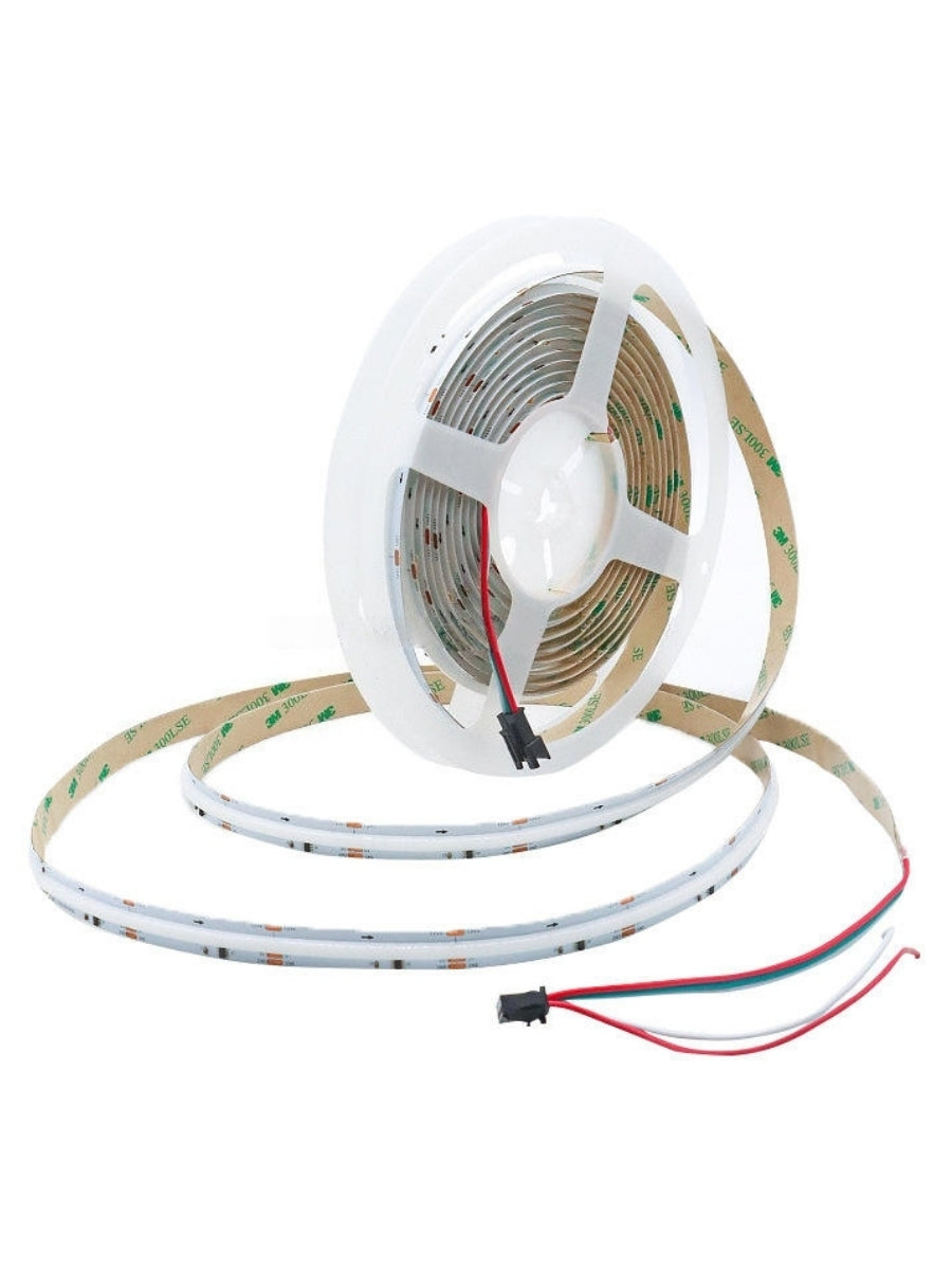 Unlit RGB LED strip on a white reel with adhesive backing, connector, and wires