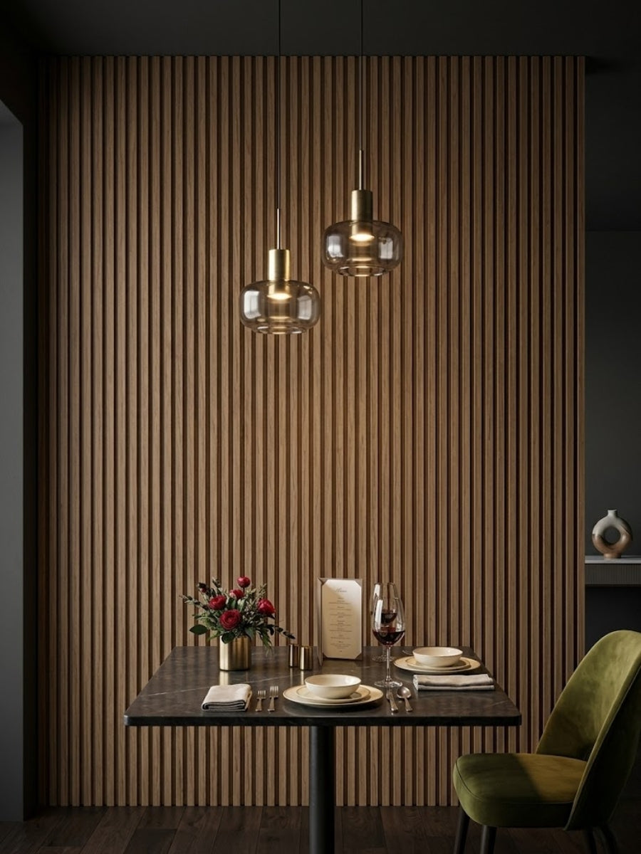 Royal Oak WPC fluted 3D wall panels behind a restaurant dining table with pendant lights
