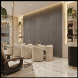 Ash gray acoustic wood slat panels covering a salon wall behind manicure stations