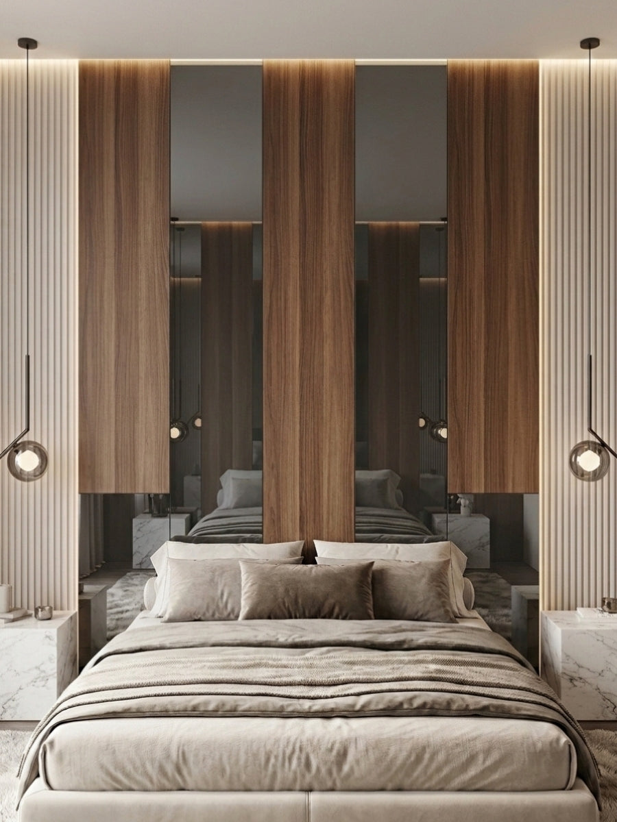 Vertical gray mirror wood veneer panels paired with walnut panels behind a contemporary upholstered bed