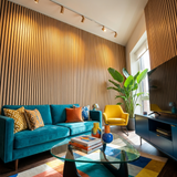 Living room with a light oak acoustic wood slat wall behind a teal sofa and yellow chair