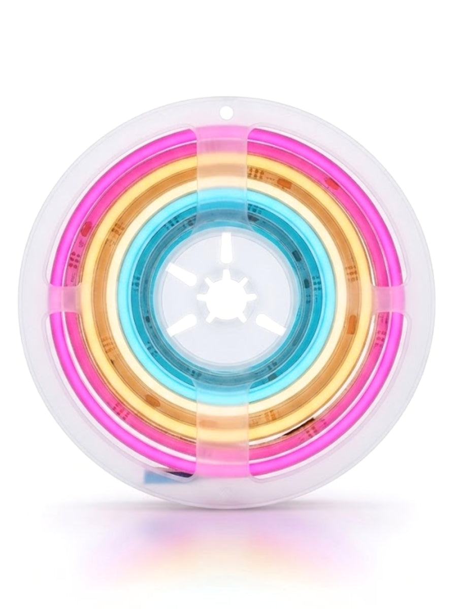 Front view of a color-changing RGB LED light strip reel illuminated in pink, amber, and blue