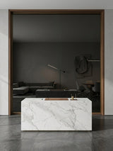 Black Mirror wood veneer panel with a dark wood frame behind a white marble reception counter