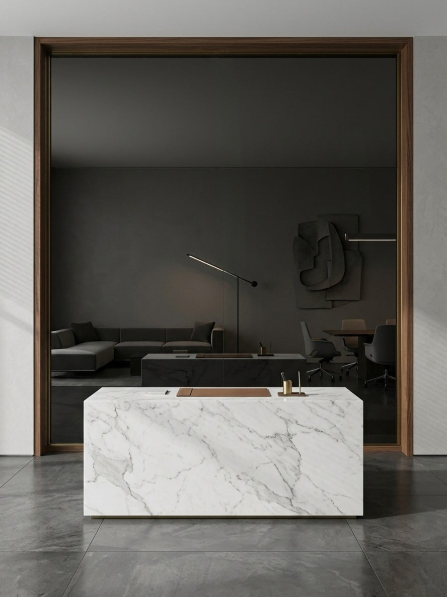 Black Mirror wood veneer panel with a dark wood frame behind a white marble reception counter