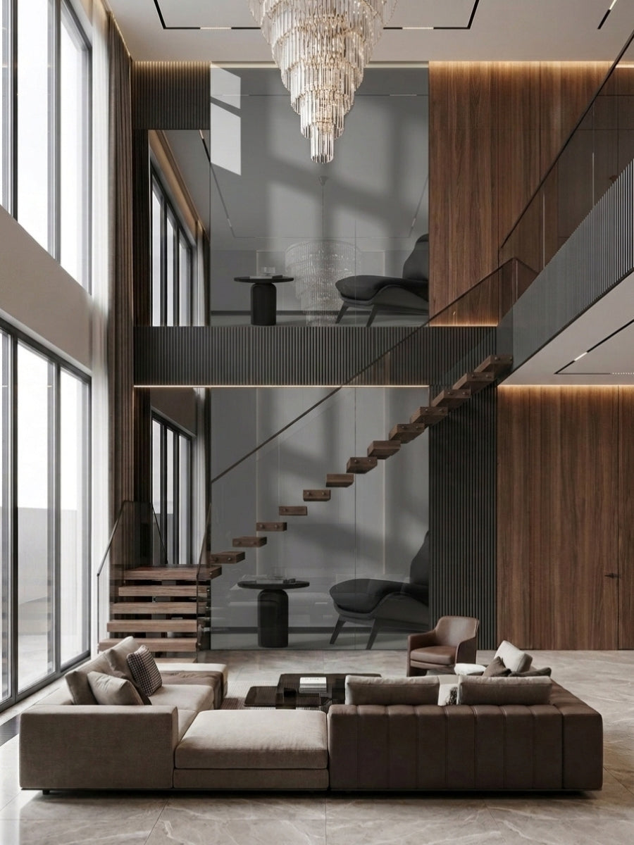 Floor-to-ceiling gray mirror wood veneer panels in a double-height living room with a floating staircase