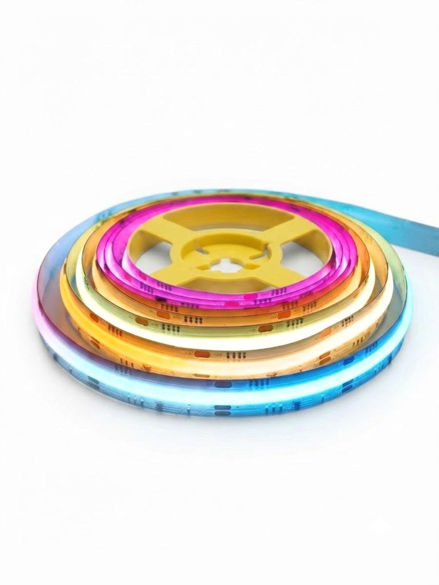 Coiled RGB LED strip lights glowing blue, amber, white, and pink around a yellow reel
