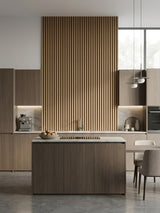 Royal Oak WPC fluted panels creating a floor-to-ceiling feature wall in a modern kitchen