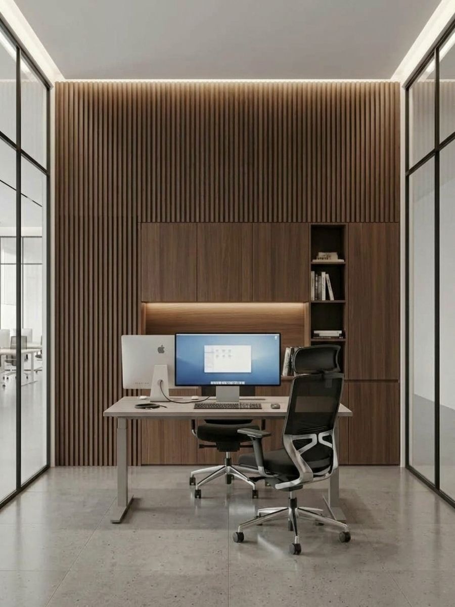 Walnut WPC fluted wall panels installed behind a desk and built-in office cabinetry