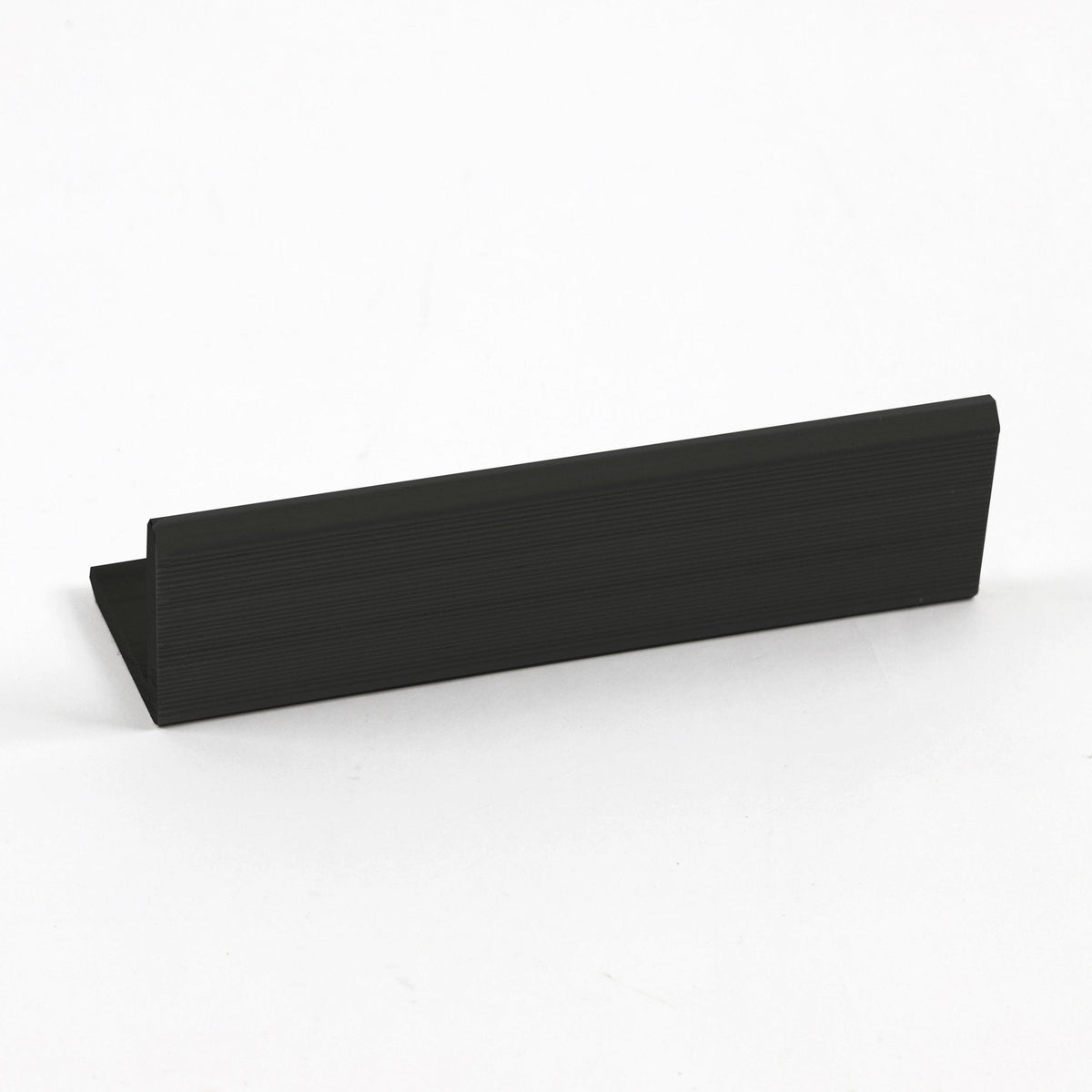Black L-shaped corner trim for wall panel edge finishing