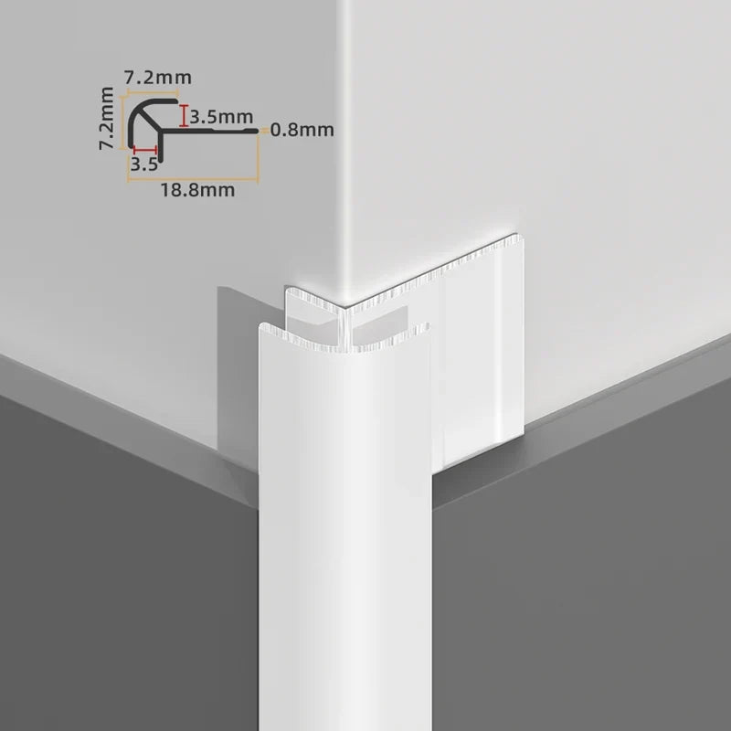 White rounded aluminum outside corner trim installed over wall panels with profile dimensions
