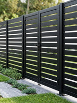 Black aluminum semi-privacy gate installed within matching horizontal slat fencing