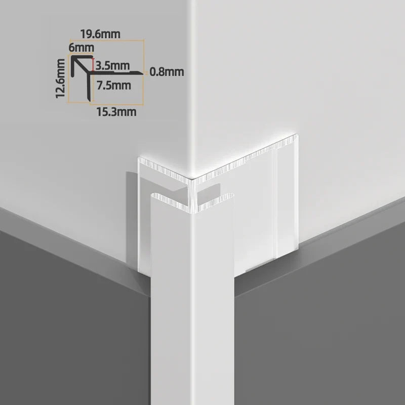 White aluminum outside corner trim installed over wall panels with angular profile dimensions