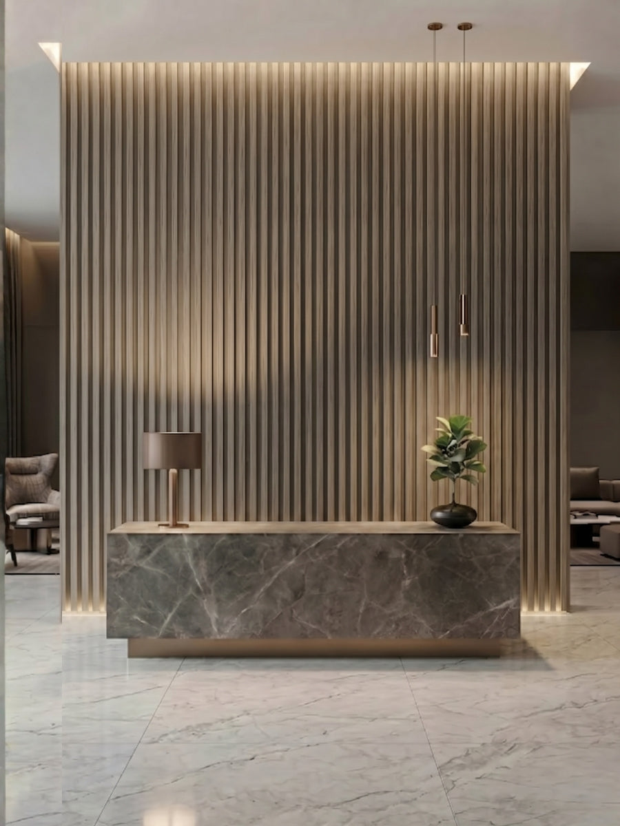 Illuminated Ash Wood WPC fluted 3D reception wall behind a stone desk