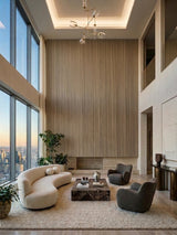 Floor-to-ceiling ash wood veneer wall panels accenting a double-height living room with modern seating