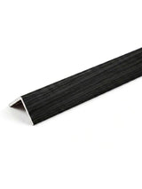 L-shaped acoustic and fluted wall panel trim with a black wood-grain finish