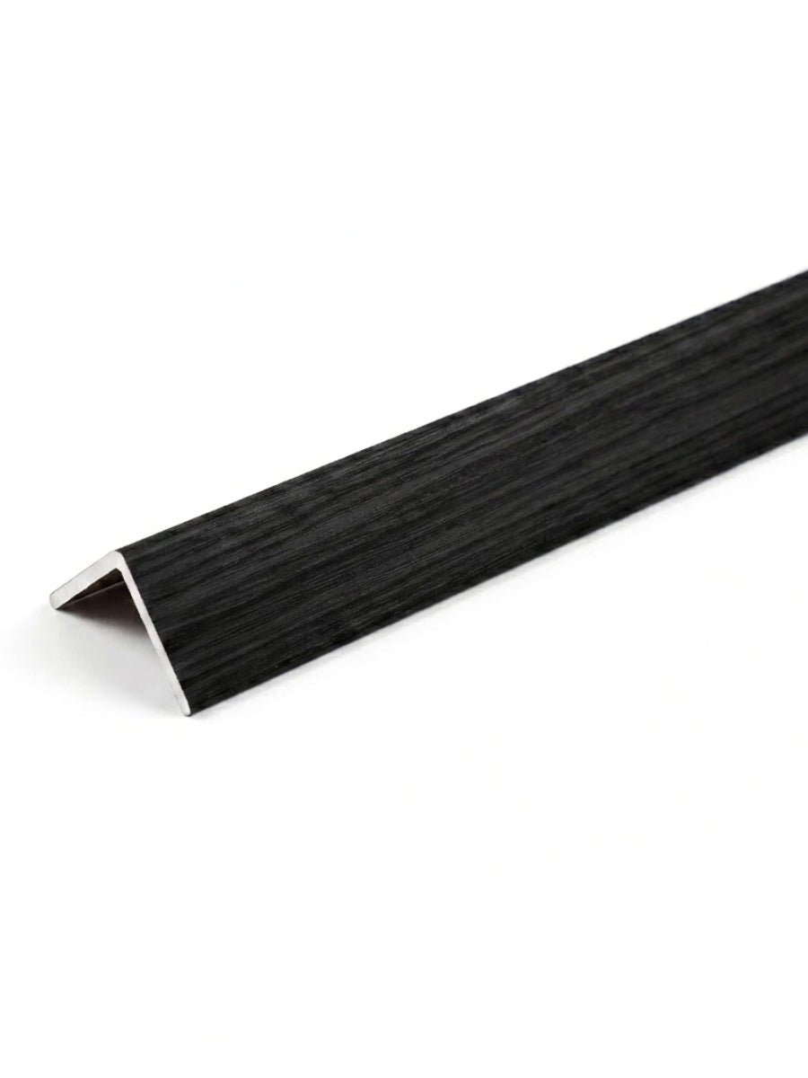 L-shaped acoustic and fluted wall panel trim with a black wood-grain finish