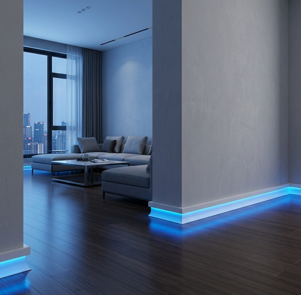 White aluminum LED baseboard molding casting blue accent light around a modern living room