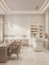 Natural beige stone-look PVC wall panels in a bright modern nail salon