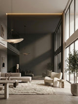 Black Mirror wood veneer panel feature wall in a spacious modern living room with neutral seating