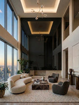 Black Mirror wood veneer panels creating a tall reflective feature wall in a contemporary lounge