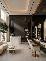Glossy Black Mirror wood veneer panel walls in a contemporary salon with illuminated oval mirrors