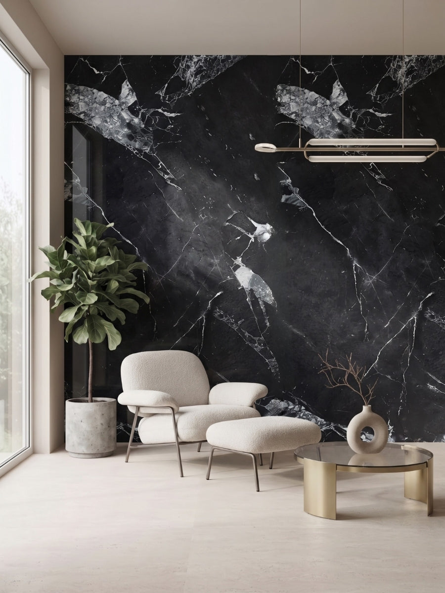 Black marble-look PVC wall panel with white veining behind a lounge chair, ottoman, and side table
