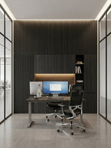 Blackwood WPC fluted accent wall in a glass-walled office with desks and chairs
