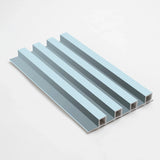 Blue WPC slat fluted wall panel sample shown at an angle with hollow profile ends