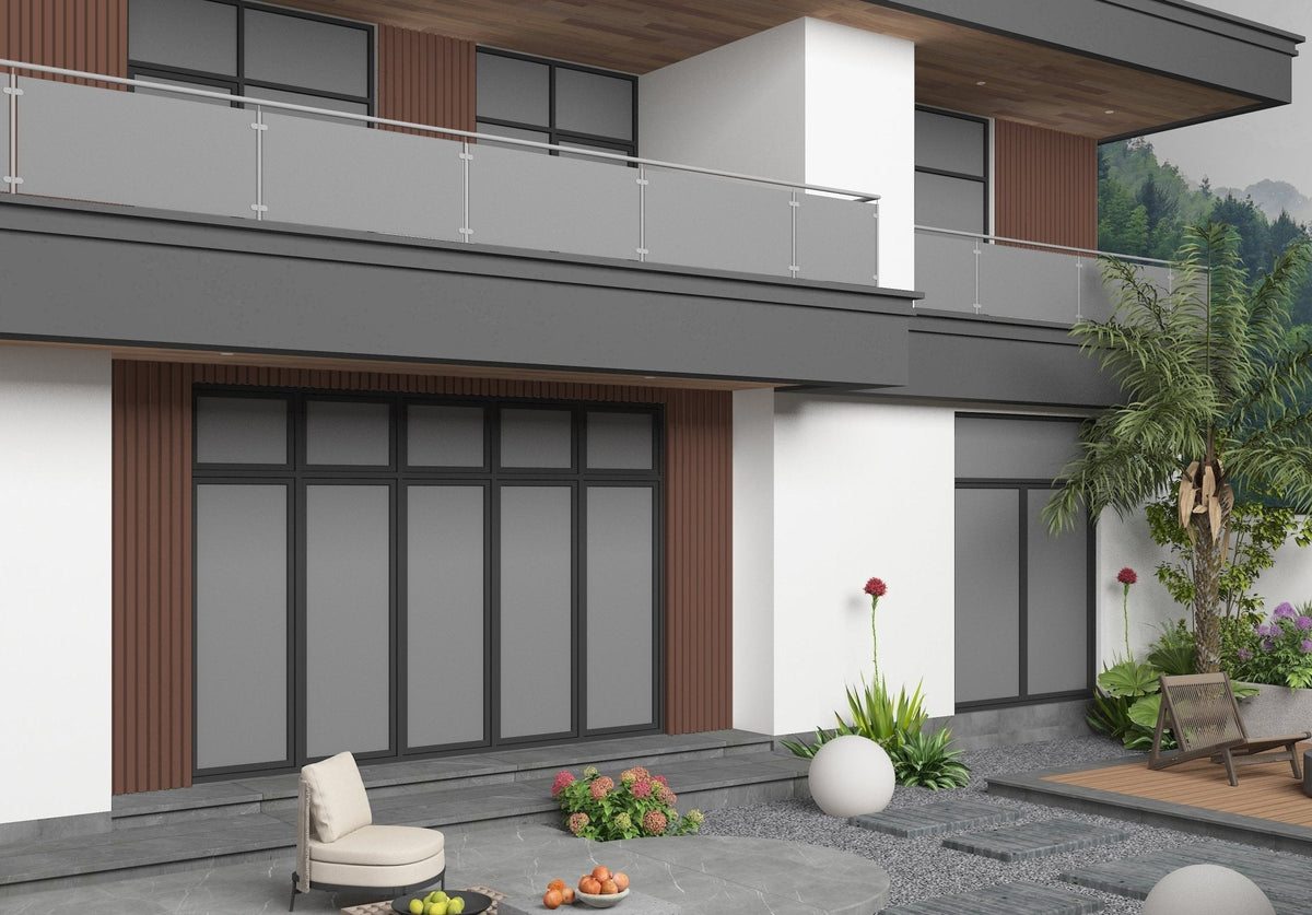 Dark brown composite exterior cladding installed around windows on a modern home with glass balcony railings