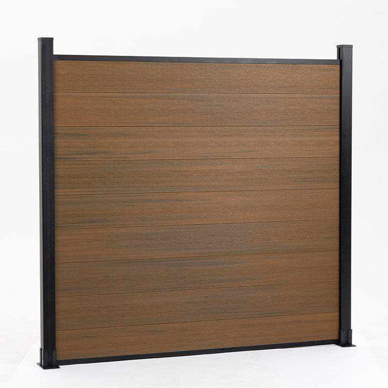 Walnut co-extruded composite privacy panel framed by black posts and rails