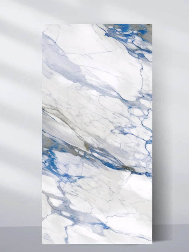 PVC marble sheet sample with bold blue and gray veining on white