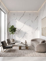Calacatta Manhattan PVC marble sheets covering the walls of a modern living room with white and gray veining